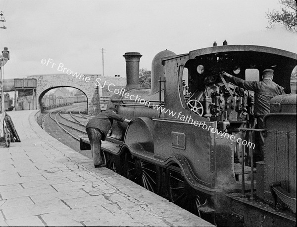 OLD LOCO SHOWING DRIVER AT FOOTPLATE
